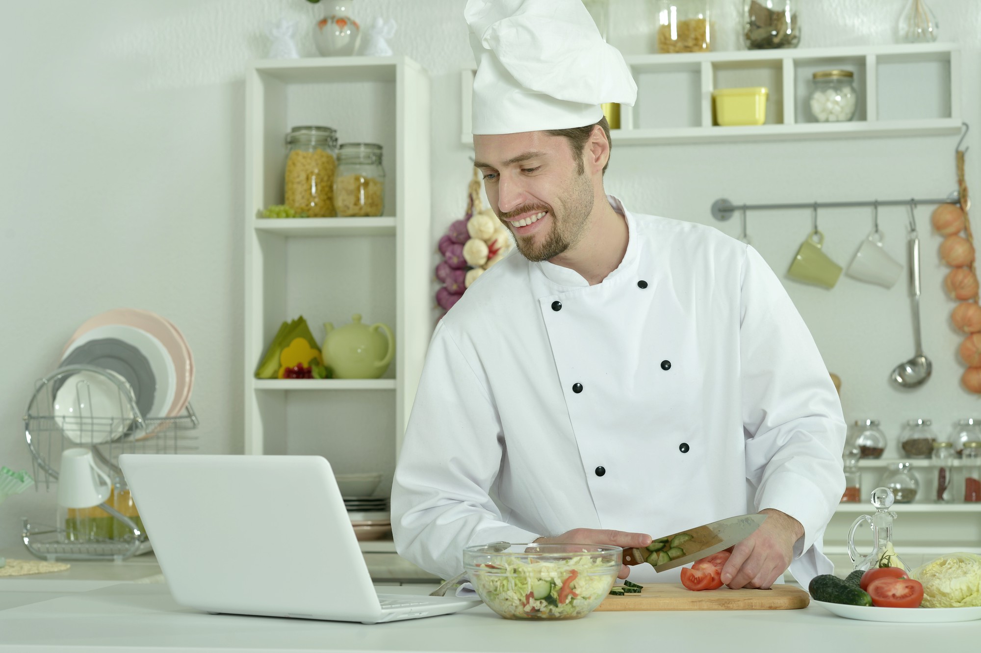 Chef teaching online class in a kitchen studio